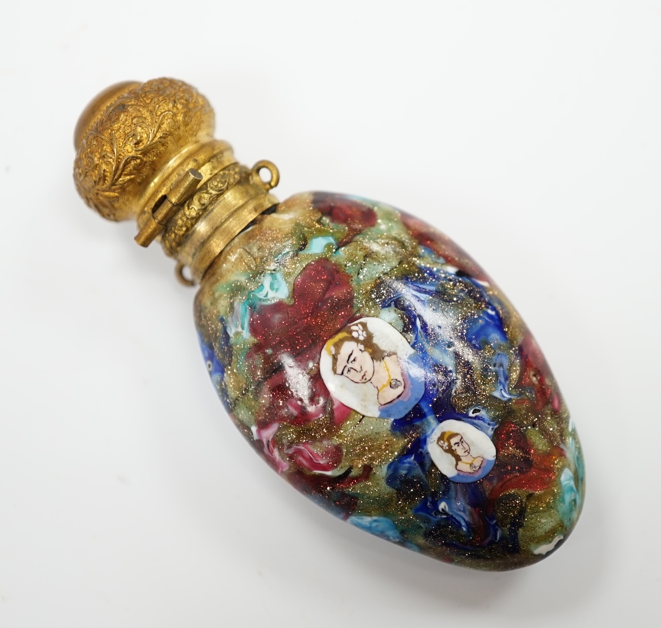 A rare Venetian scent bottle by Francini with inset portrait canes and gilt metal mount, 7.5cm high